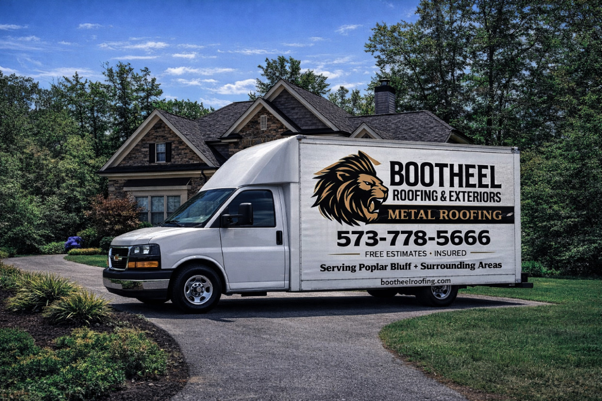 Bootheel Roofing truck in front of home